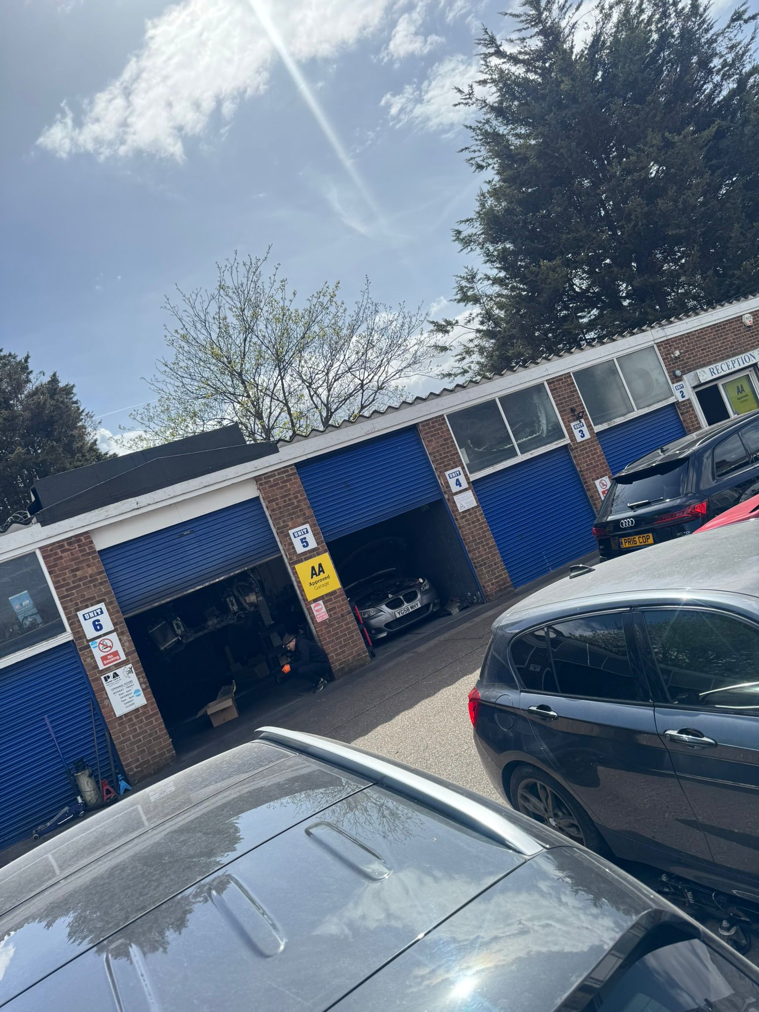 Many cars in the garage